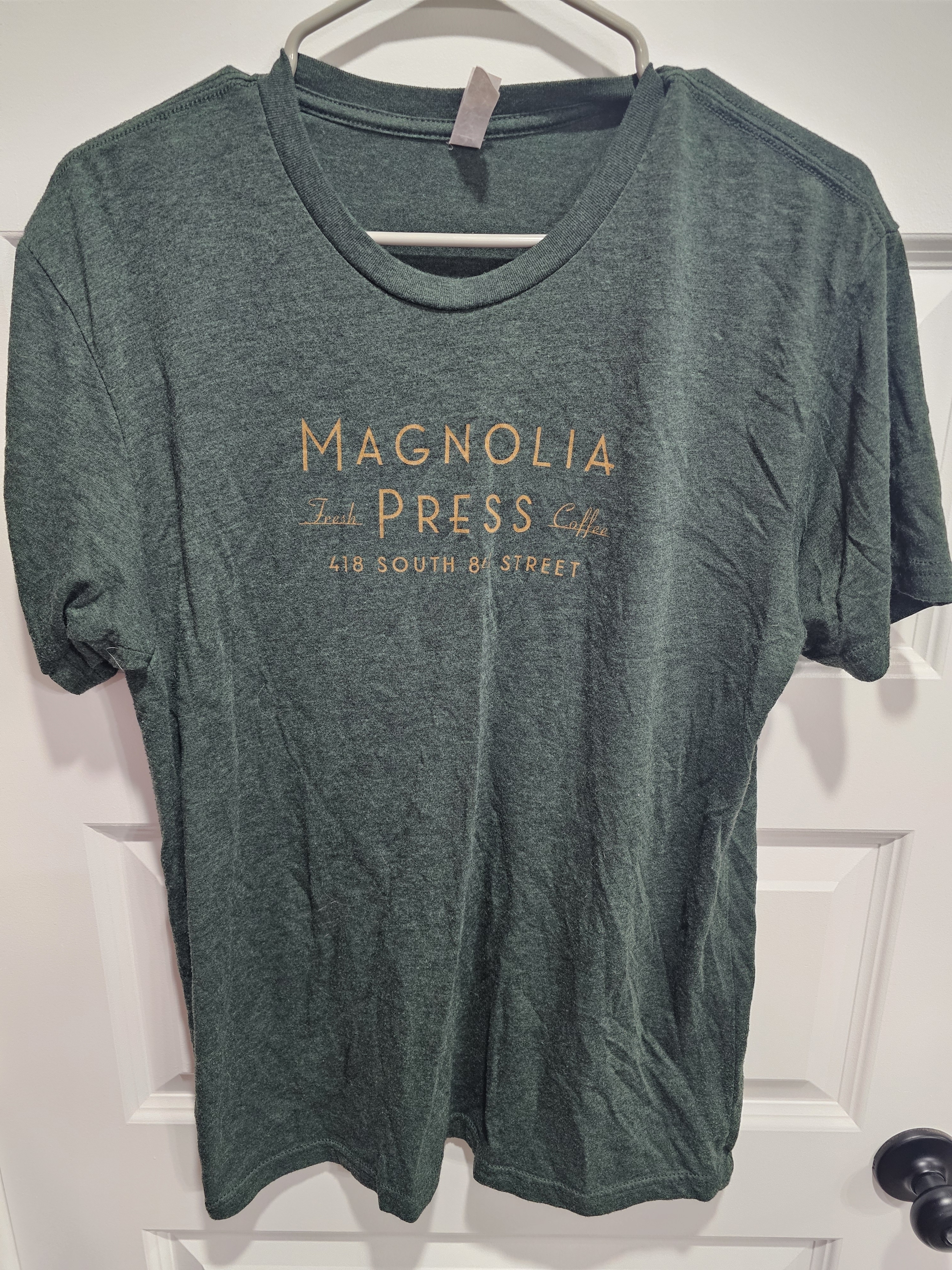 Magnolia Mens Dark Green Tee With Gold Logo